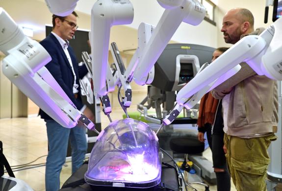 Have a go at being a robotic surgeon!